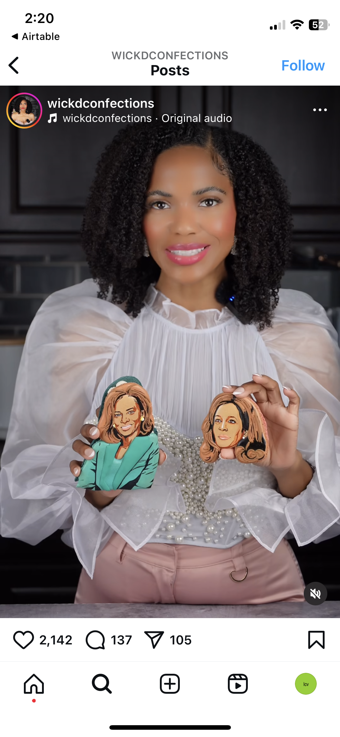 Screenshot of an Instagram post showing a woman holding two cookies decorated to look like Kamala Harris.